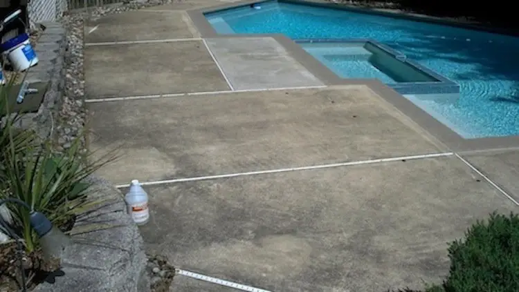 Concrete &  Masonry Solutions: Cleaning Black Mildew Stains from Pool Decks